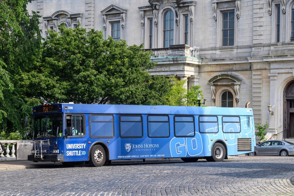 University Shuttle with Johns Hopkins logo and branding