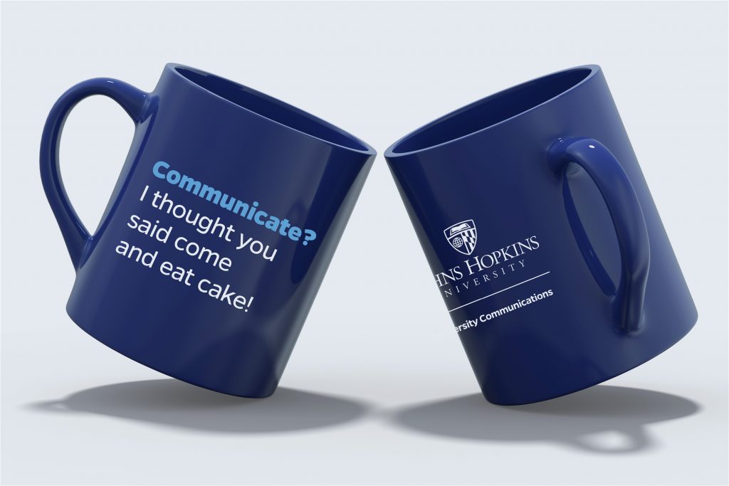 University Communications mug with a unit lock-up on one side and a quote on the other.