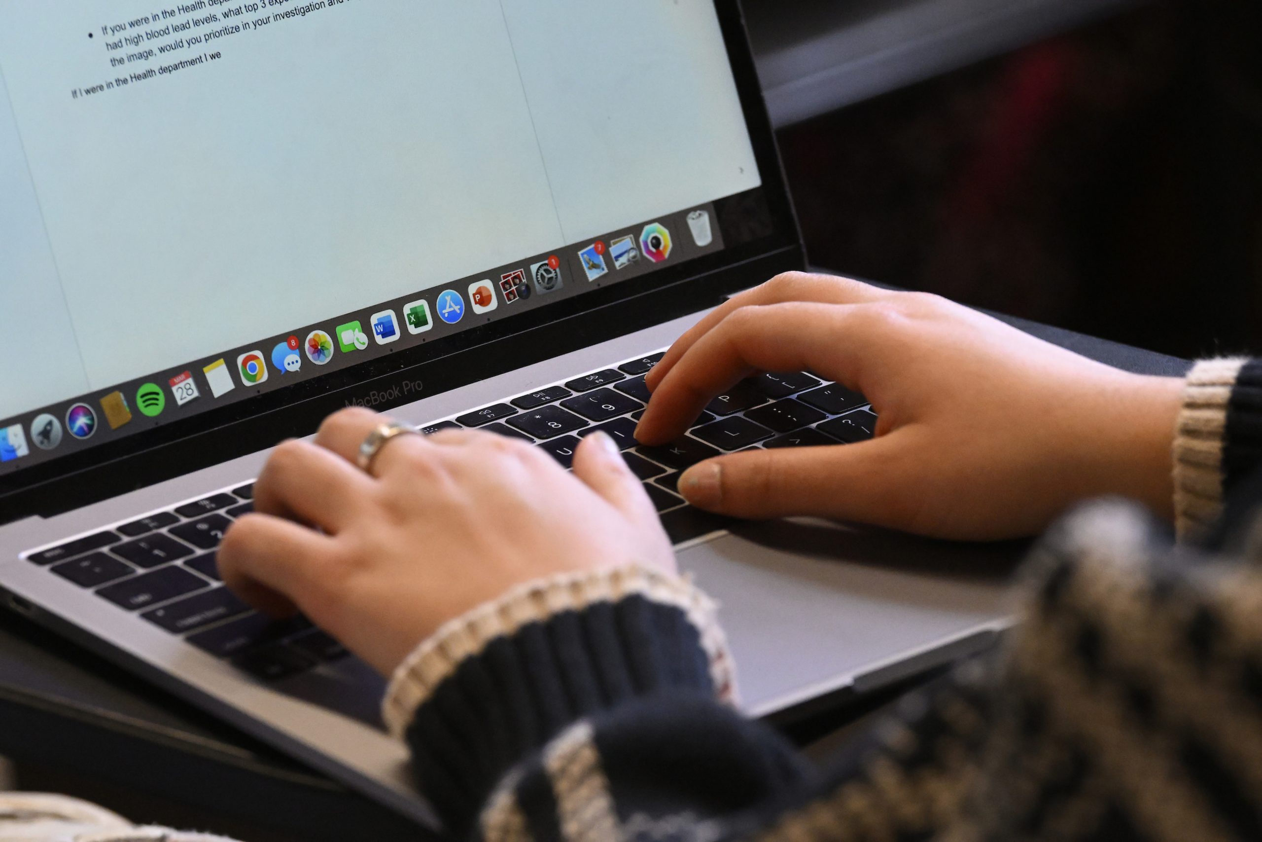 Person typing on computer