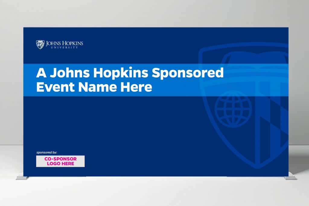 Mockup of backdrop banner with Johns Hopkins University logo set prominently on the top of the banner with placeholder space for co-sponsor logo at the bottom of the banner.