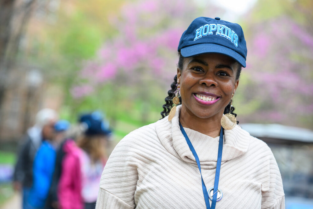 JHU employee wearing Hopkins hat