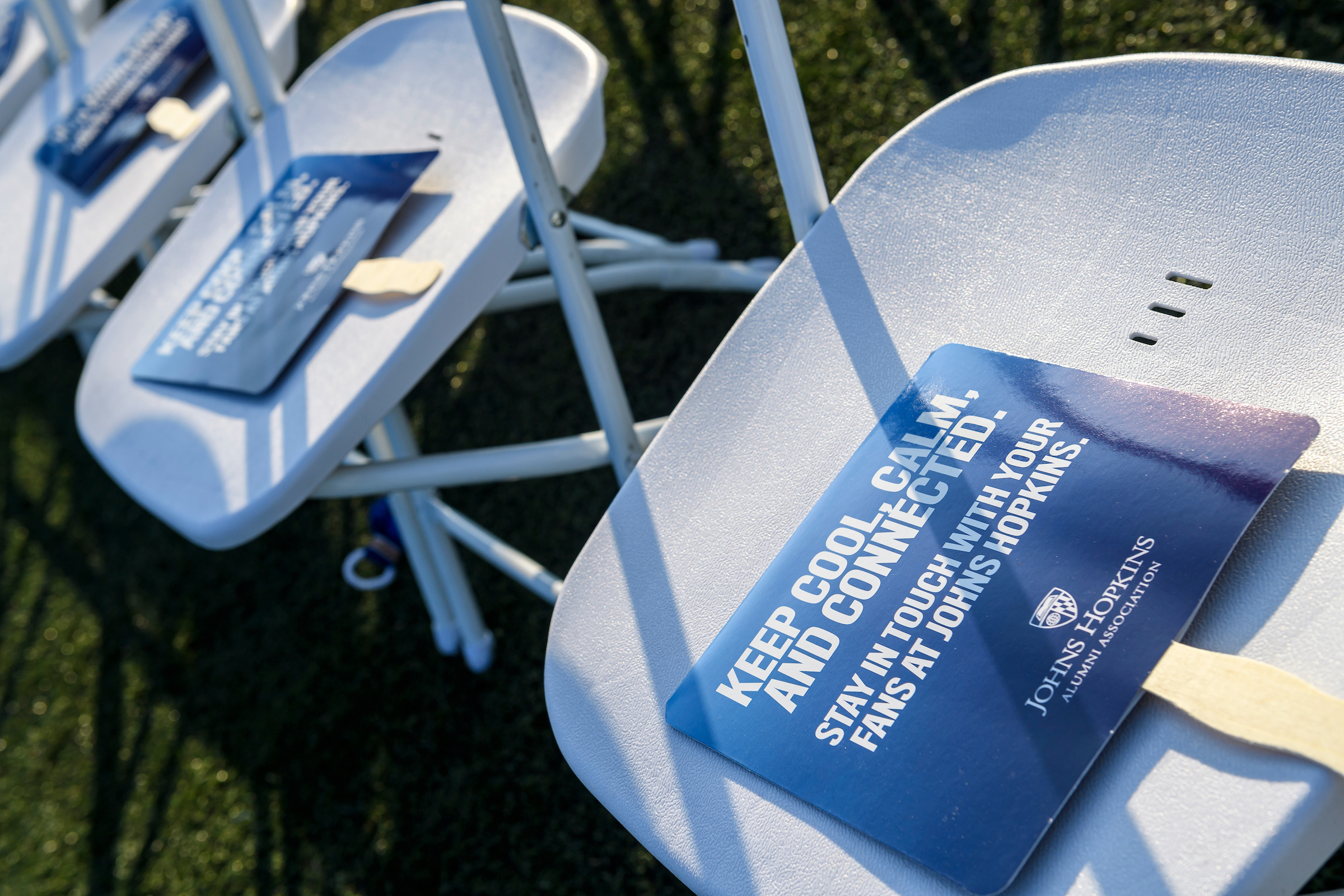 Hand fans on chairs for an event